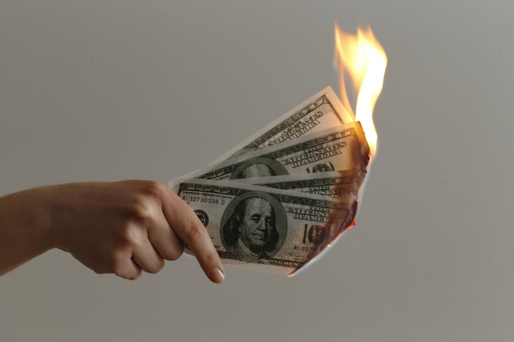 Photo-of-money-on-fire